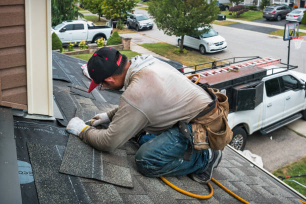 Professional Roof Leak Repair technician working in Brimfield, OH